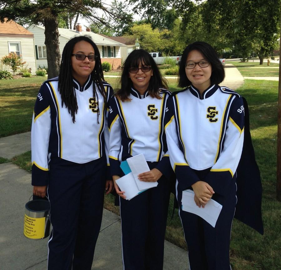 From Left: Juniors Jordan Thompson, Shruti Gupta and Jessica Pan collect money to support the SHS Band, Orchestra and Starlettes on Tag Day.