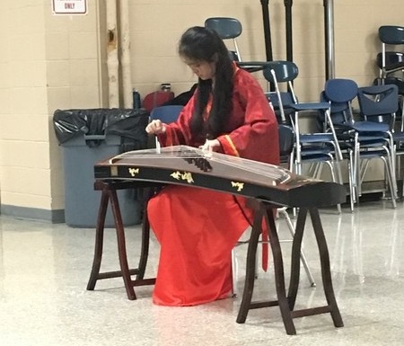 June Fan played Xi Bei Qing Yun on the traditional Chinese instrument Gu Zheng that is sometimes called the Chinese piano. 