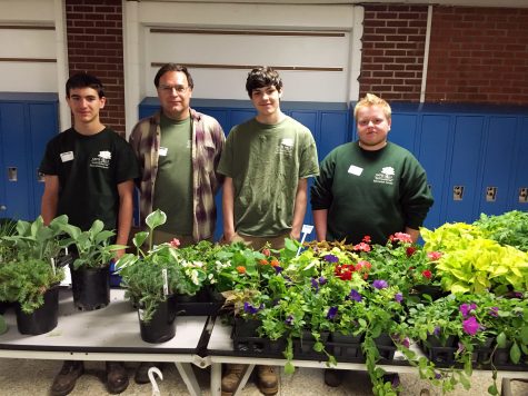 From right to left: Kai Beller, Jordan Drake, Ed Tuhela and Joe Gantous, who's in 8th grade and joining the landscaping program next year.