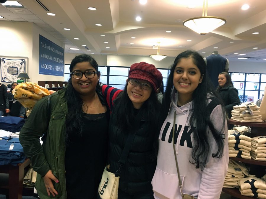 Diana Huang found the rain to bring out the old architecture to be the most beautiful thing about Yale. Pictured from left to right: Madhavi Kumar, Diana Huang and Kuljit Kaur.