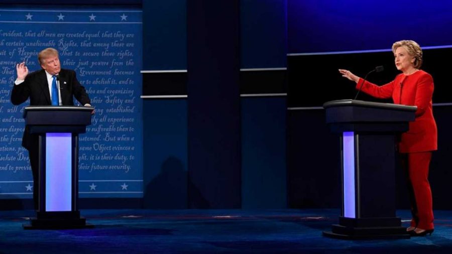 Presidential nominees Donald Trump and Hillary Clinton debate against one another on the issues of immigration, police responsibility and economic policies.
