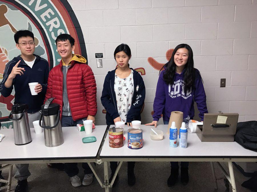 Pictured from left to right: Lewis Zou, Luke Qin, Sandy Shen and Alice Wu selling hot chocolate outside of the bookstore.