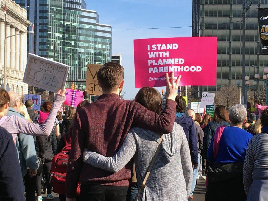 Abortion rights and access to birth control were hot topics at the march, as protesters of all genders carried Planned Parenthood and NARAL signs through the streets. Some even carried coat hangers to make a symbolic statement.