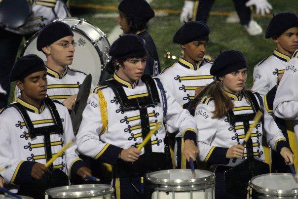 Kristen (bottom, right) played drums in SHS marching band’s drumline.