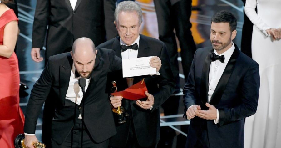La La Land’s Producer, Jordan Horowitz, clarifies the winner to the audience after snatching the correct card out of Warren Beatty’s hand.
