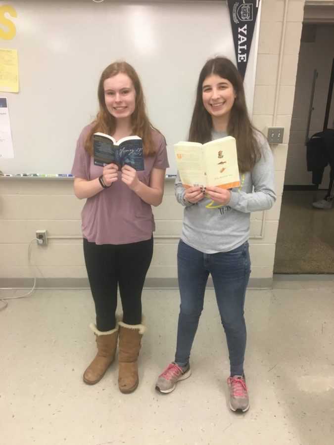 Senior Julia Mayer and junior Carly Stewart show off well-read books.