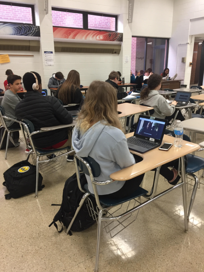 Students hard at work watching a movie in Solon High Schools study hall. 