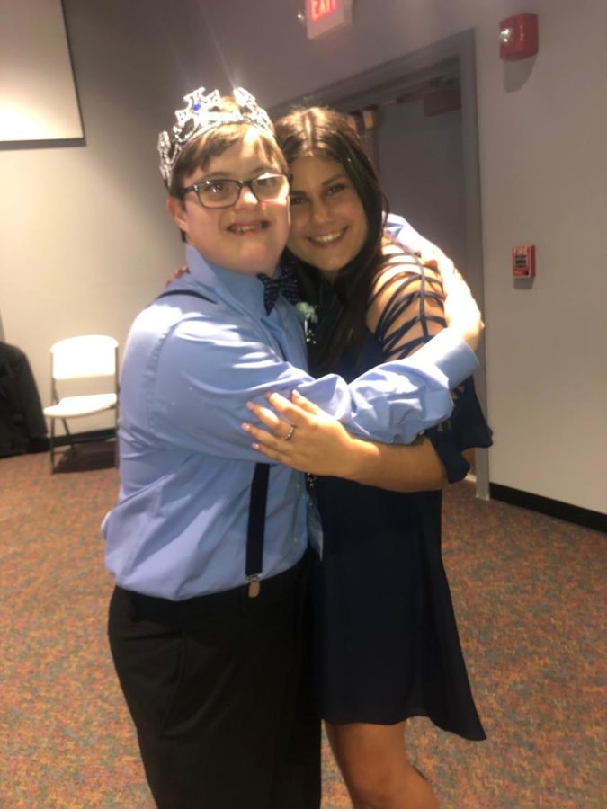 Lexi Simmerson participating In Night To Shine, a prom for special needs adults and children, with her date Alex Kowalski