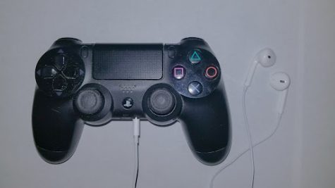 Dualshock 4 with earbuds plugged in. 