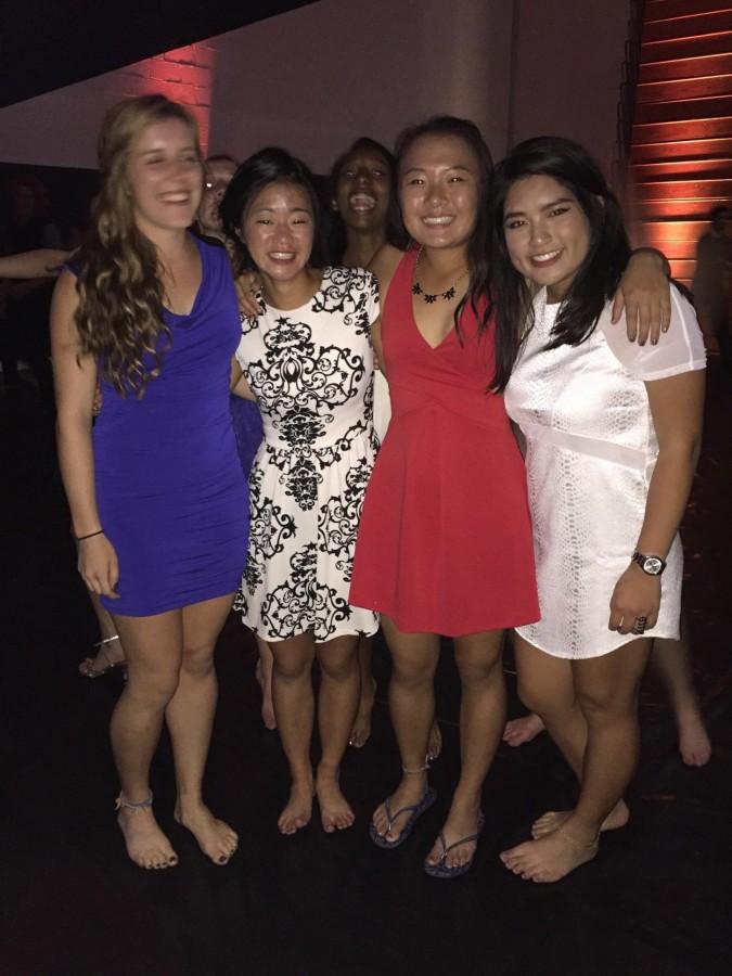 Seniors Andi Kasper, Emily Hansen, Jasmine Feng and Lois Wu inside the gym