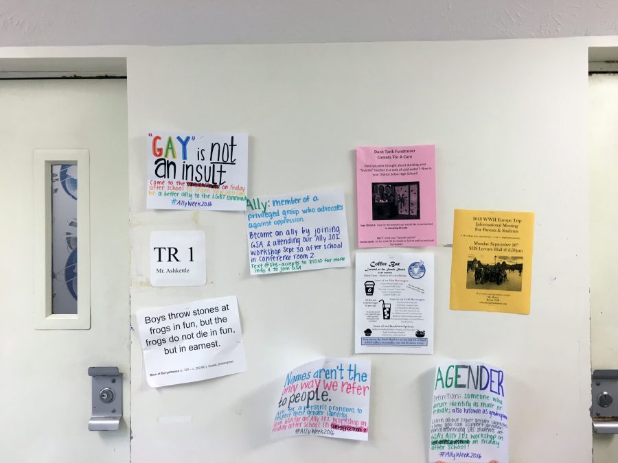 Informational GSA Ally Week posters decorate the walls outside Mr. Ashkettle's classroom. 