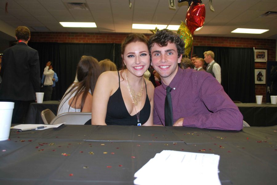 Senior Isabella Achim (left), pictured with Skylar Lunardi (right), said “dressing up” is her favorite part of homecoming.