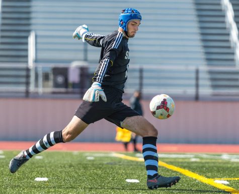 Lombardo scores a goal as he practices with the Solon Comets boys' soccer team.