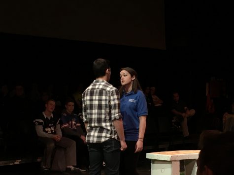 Beatrice (Jesse Uguccini) and Benedick (Greg Davidson) have a tense conversation.