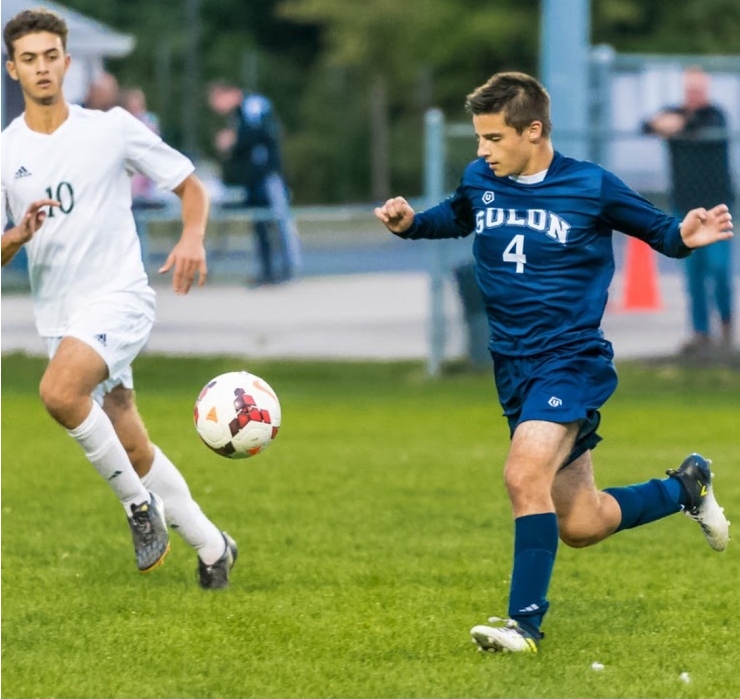 Noah Braun playing for the Solon Comets (in blue). Courtesy of Noah Braun.