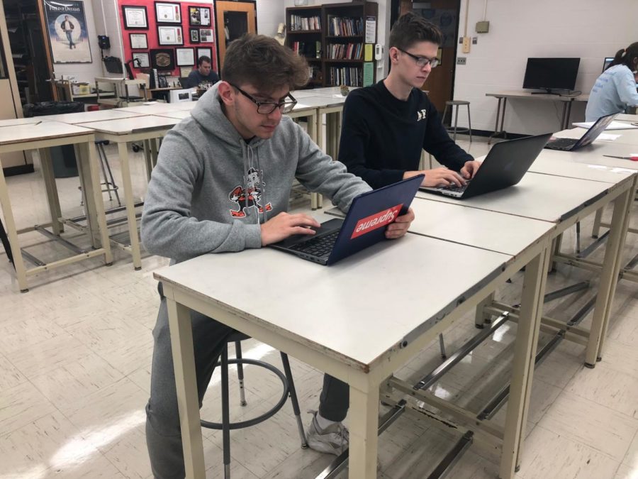 Seniors Nathan (Nate) Miller and Joshua (Josh) Paskert fill out the Common Application. Photo taken by Riyah Ali.