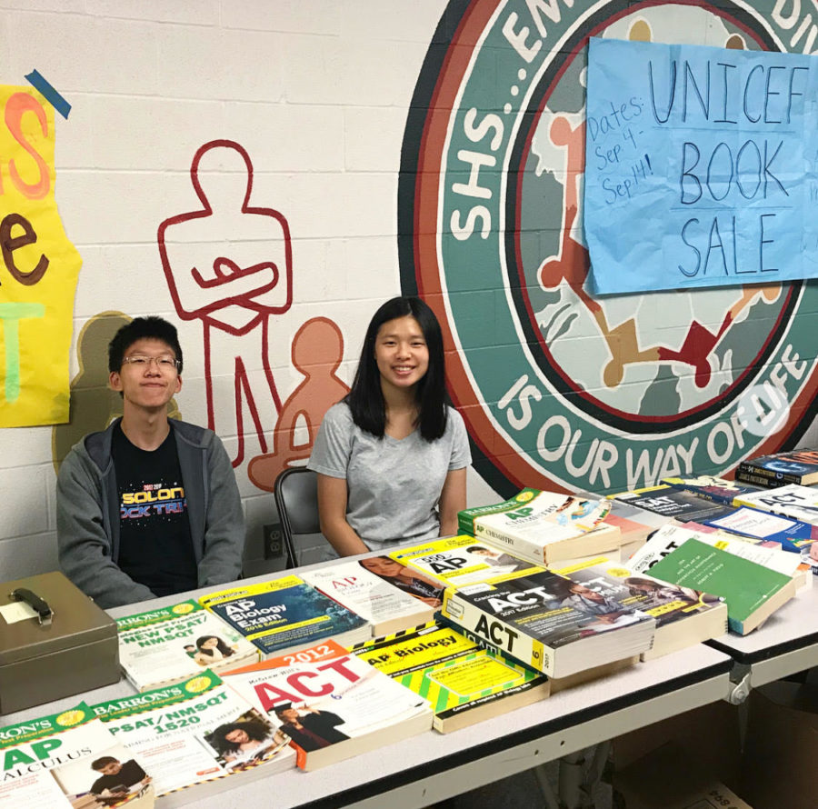 Wesley Shen and Sandy Shen selling books for the UNICEF book sale.
Photo take from Instagram.