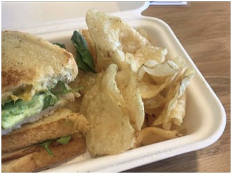 A panini sandwich and chips Baek ordered at Luna Bakery and Cafe during her lunch period
