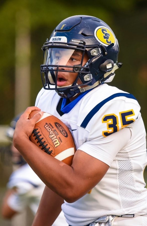 Edward Taylor running with the football.

Picture Credits- Edward Taylor