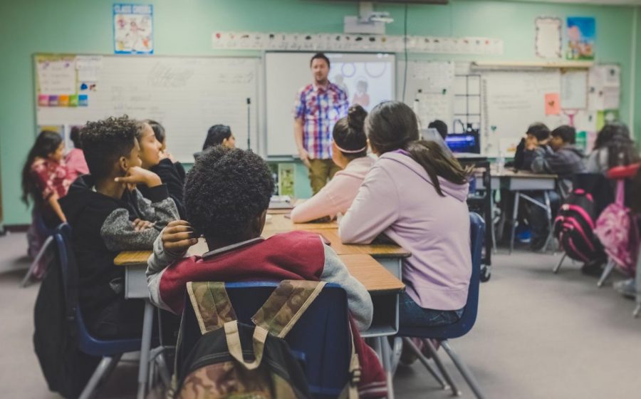 A classroom with students, courtesy of unsplash.com