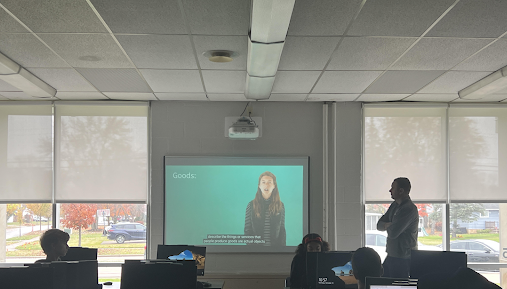 Stircula teaching his 4a-4b marketing class.