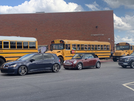 Busses outside of the SHS Pool Pad.