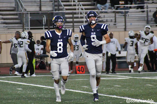 Noah Fried and Harley Barmen running on the field at the Sept. 29 game. Photo Courtesy of @CometCandids. 