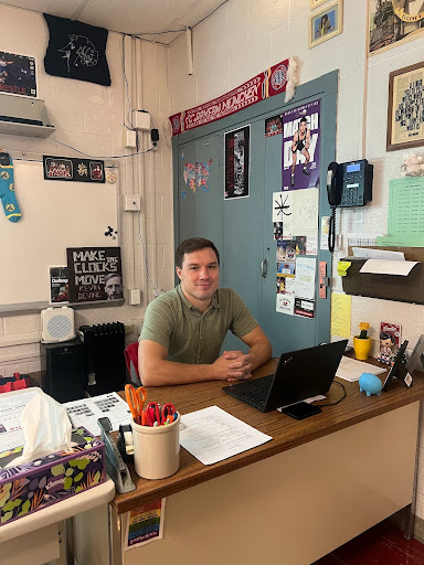 Picture of Connor McMahon in his classroom.