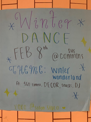 A poster outside of the Bookstore to promote Student Council’s upcoming Winter Dance.