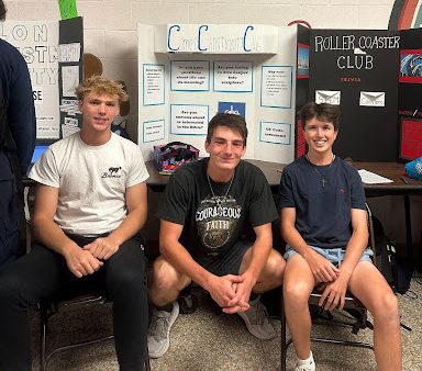Comet Christian Club Officers Jake Taylor, Easton Evans and Benji Strosaker at the club fair. 