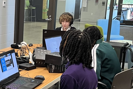 Students Rachel Torgov and Robert Bradley do IT work on their computers, October 9, 2025. Photo taken and provided by Ronald Suchy.