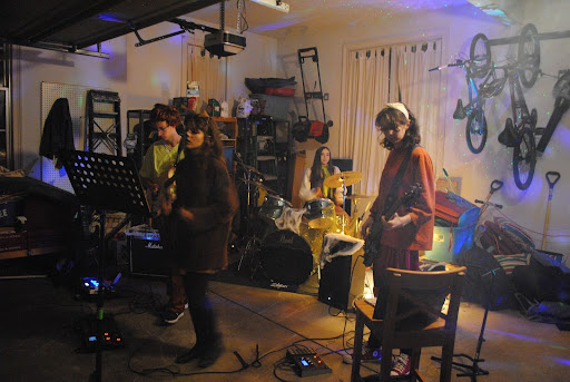 Something for Saturday at their garage show on Halloween night dressed up as "Scooby-Doo" characters. Band members in order from left to right are Jacob Liebson on guitar, Paxton Kirby on vocals, Mia Bugarcic on drums and Abigail Goodman on bass.
