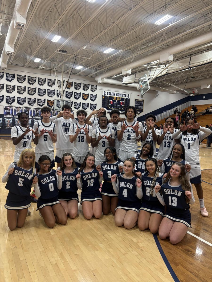 The cheerleaders and basketball team  celebrated after  they won against North Royalton on Jan. 25  Picture courtesy of head varsity cheerleading Coach Brooke Schwartz.